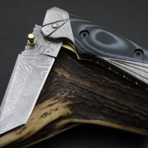 Handmade 6.5″ Damascus Steel Folding Tanto Knife – Custom Linerlock Pocket Knife with Dual-Tone Black Canvas Micarta Handle, Sculpted Damascus Bolsters, and Brass Accents